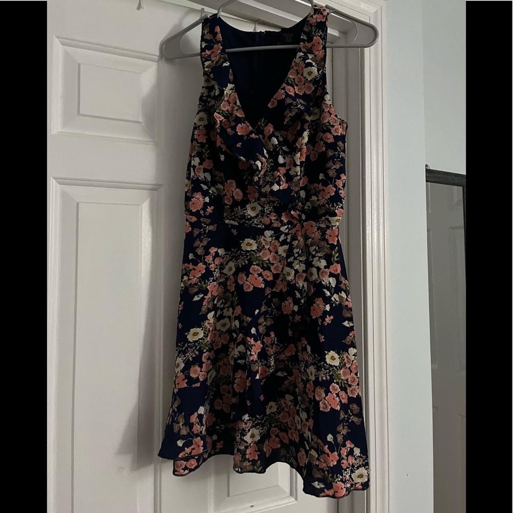 Floral dress. Background is navy